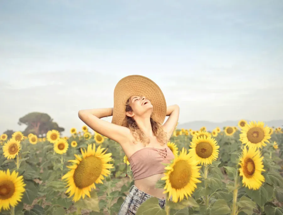 Woman in sunflower field